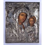 AN ANTIQUE RUSSIAN SILVER MOUNTED WOOD ICON. 27 cm x 21 cm.