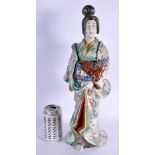 A LARGE 19TH CENTURY JAPANESE MEIJI PERIOD PORCELAIN FIGURE OF A GEISHA modelled in floral robes. 45