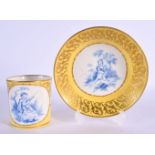 Sevres rare yellow ground coffee can and saucer, the can painted in blue with a child fishing on a y