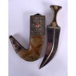 AN ANTIQUE OMANI CARVED RHINOCEROS HORN JAMBIYA DAGGER inset with agate. 30 cm wide.