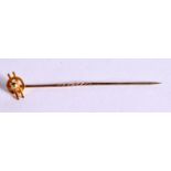 A CASED 15CT GOLD LAPEL PIN. Stamped 15K, 5.8cm long, weight 1.2g