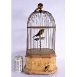 A LARGE 19TH CENTURY EURUOPEAN GILT WOOD AUTOMATON SINGING BIRD CAGE decorated all over with acanthu