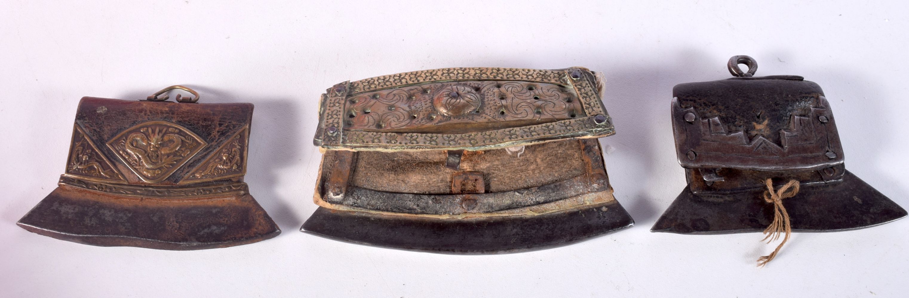 A collection of three 19th Century Tibetan Tinder purses 12cm (3).