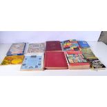 A quantity of stamp albums , stamp reference books and collectors cards