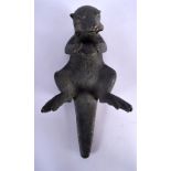 AN UNUSUAL EUROPEAN BRONZE FIGURE OF AN OTTER No 4 of 30, modelled clutching a nut. 36 cm x 14 cm.