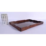 A GOOD 19TH CENTURY CHINESE HUANGHUALI RECTANGULAR FORM TRAY with dipped side rails. 34 cm x 24 cm.