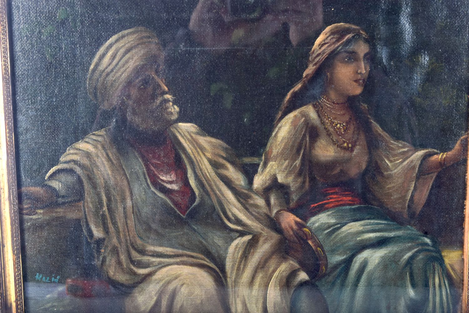 A framed oil on board of a middle Eastern couple signed Khaild 28 x 38cm. - Bild 2 aus 4