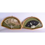 A PAIR OF 19TH CENTURY FRENCH SILK WORK FANS depicting females and landscapes. 50 cm x 35 cm.