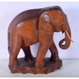 A large carved wooden Elephant 29 x 32 cm