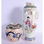 A CHINESE REPUBLICAN PERIOD FAMILLE ROSE VASE together with a dragon jar. Largest 27 cm high. (2)