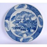 A LARGE 19TH CENTURY CHINESE BLUE AND WHITE PORCELAIN DISH Qing, painted with landscapes. 28.5 cm di