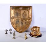 A collection of small brass/metal items shield, figures and a chronometer base largest 39cm(4).