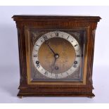 A GARRARD & CO LONDON OAK MANTEL CLOCK. 24 cm x 21 cm.