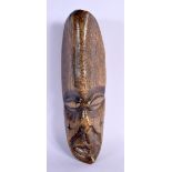 A 19TH CENTURY AFRICAN TRIBAL CARVED BONE LEGA MASK with cross motifs to cheeks. 23 cm x 6 cm.