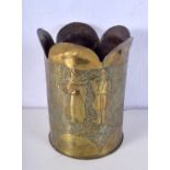 A heavy trench art hammered shell vase 24 cm.