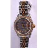 LADIES STEEL AND GOLD ROLEX DATEJUST WITH CUSTOM PINK MOTHER OF PEARL DIAMOND DIAL BEZEL AND SHOULDE