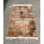 A Ivory ground Persian rug 184 x 120 cm.