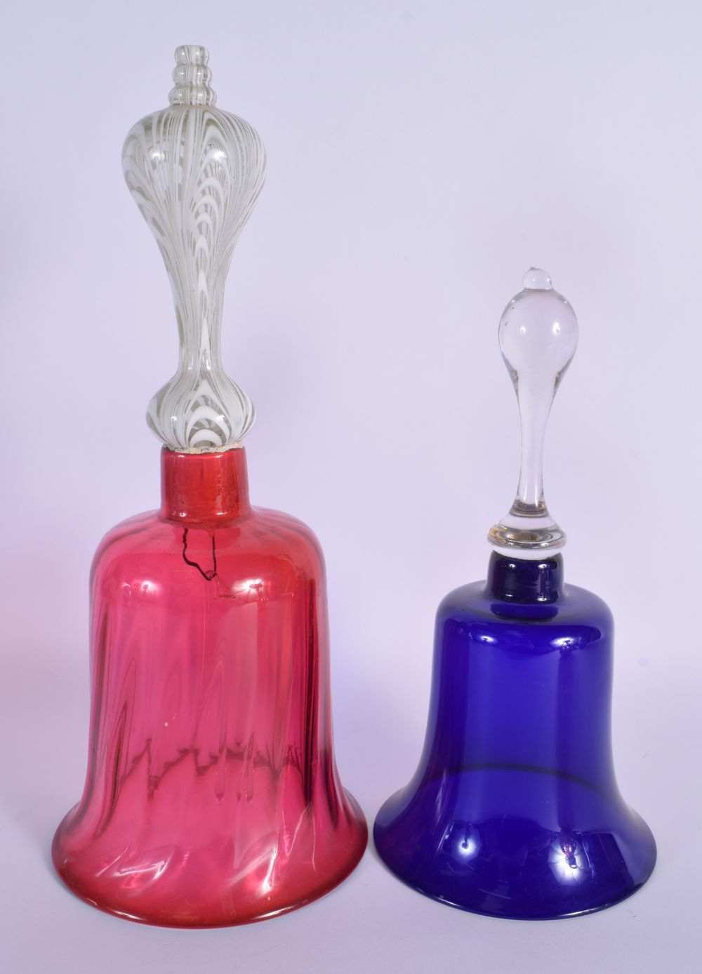 A PAIR OF BOHEMIAN BLUE FLASH DECANTERS with stoppers, together with a vase & bells. Largest 34 cm h - Bild 5 aus 7