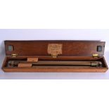 A CASED ANTIQUE PRESENTATION SCIENTIFIC MATHMATIC INSTRUMENT. 63 cm x 10 cm.