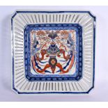 A 19TH CENTURY JAPANESE MEIJI PERIOD BLUE AND WHITE IMARI PHOENIX DISH with reticulated border. 28 c