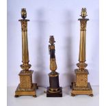 A pair of 19th Century French gilt column lamp bases converted to electric together with another Fre
