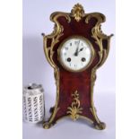 A LATE 19TH CENTURY FRENCH GILT BRONZE AND TORTOISESHELL MANTEL CLOCK of scrolling organic form. 33