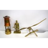 A large brass Eagle together with a minors lamp and a brass model of a minor 25 x 46 cm (3)