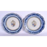 A FINE PAIR OF 18TH CENTURY CHINESE EXPORT ARMORIAL CRESTED PLATES Qianlong, painted with a border o