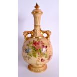 ROYAL WORCESTER VASE AND COVER WITH TWO MASK HANDLES PAINTED WITH FLOWERS ON A BLUSH IVORY GROUND, S