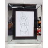 A framed ink drawing of a by Rosa-Maria Dudzinski of a female. 27 x 20 cm.