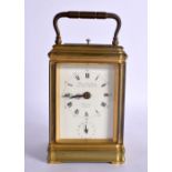 AN ANTIQUE REPEATING CHARLES FRODSHAM CARRIAGE CLOCK with strike silent feature to base. 16 cm high