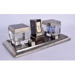 AN UNUSUAL 1940S ART DECO CHROME AND BAKELITE DESK STAND with glass inkwells. 20 cm x 9 cm.