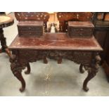 AN EARLY 20TH CENTURY JAPANESE MEIJI PERIOD CARVED WOOD DESK decorated with foliage. 110 cm x 92 cm