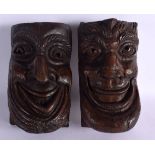 A PAIR OF 18TH CENTURY CARVED WOOD THEATRICAL TREEN MASK HEADS. 20 cm x 9 cm.