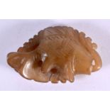 A 19TH CENTURY CHINESE CARVED MUTTON JADE FIGURE OF A FISH Qing. 5 cm x 3 cm.