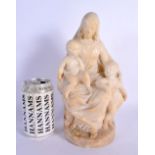 A 17TH/18TH CENTURY EUROPEAN CARVED ALABASTER FIGURE OF A FEMALE modelled with two children. 26 cm x