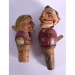 TWO VINTAGE BAVARIAN BLACK FOREST AUTOMATON BOTTLE STOPPERS. 12.25 cm long. (2)