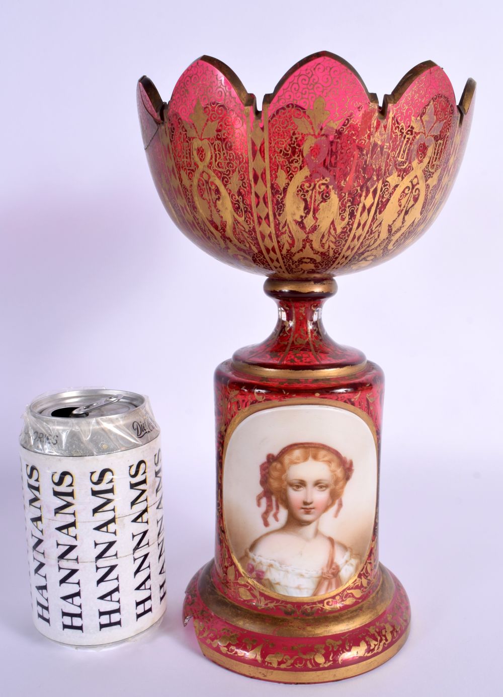 A 19TH CENTURY BOHEMIAN ENAMELLED RUBY GLASS COMPORT TAZZA painted with a female portrait. 25 cm x 1