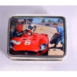 A SILVER PILL AND ENAMEL PILL BOX DECORATED WITH A VINTAGE RACING CAR. Stamped Sterling, 1.2cm x 2.
