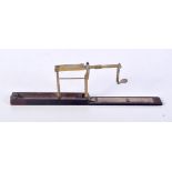 An antique portable Stephen Houghton and Co cased brass balance 14 cm