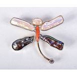 A silver dragon fly broach 5 x 5 cm.