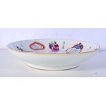 A Chinese porcelain dish decorated with figures and calligraphy 5 x 22cm.