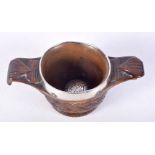 AN ANTIQUE SCOTTISH SILVER CARVED WOOD QUAICH. 12 cm wide.