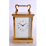 A BOXED CARRIAGE CLOCK BY GARRARD. Hight 17cm (handle extended), width 9.2cm, with key