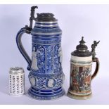 A LARGE GERMAN WESTERVALD TYPE STONEWARE FLAGON together with a smaller Mettlach stein. Largest 40 c