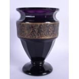 A RARE MOSER CZECH PURPLE GLASS VASE decorated with a banding of figures. 15 cm x 10 cm.