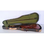 A cased violin with bow 57 cm.