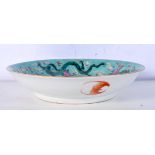 A Chinese porcelain Famille verte dish decorated with a dragon 5 x 21cm.