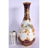 A CHARMING AESTHETHIC MOVEMENT ENAMELLED GLASS VASE painted with birds and flowers. 34 cm high.