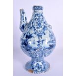 A 19TH CENTURY DELFT BLUE AND WHITE TIN GLAZED EWER painted with boats and landscapes. 26 cm x 12 cm